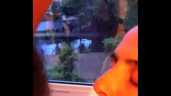 Najboljši Wife sucks cock at window for neighbors to see kul videoposnetki